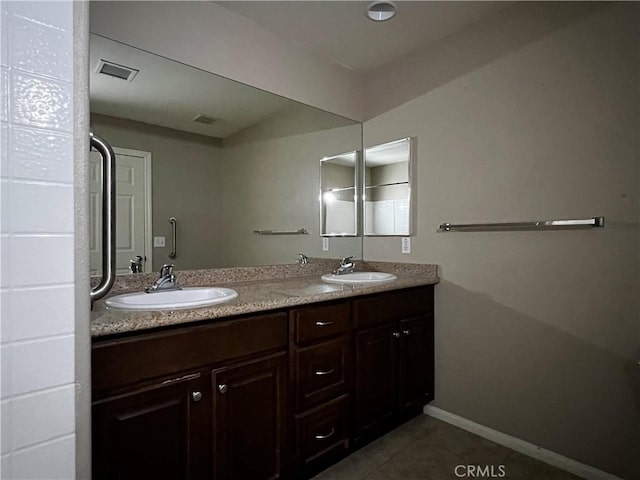 bathroom featuring vanity and tile patterned floors