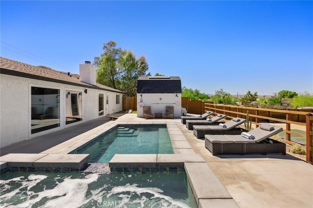 view of pool featuring a patio area