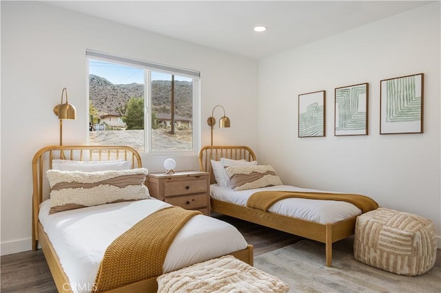 bedroom with wood-type flooring