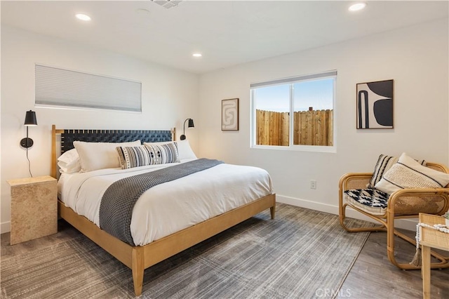 bedroom featuring dark hardwood / wood-style floors