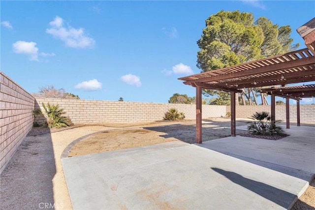 view of patio featuring a pergola