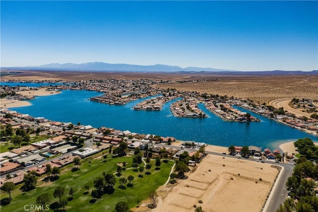 bird's eye view featuring a water and mountain view