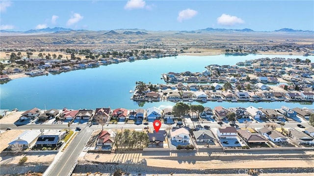 aerial view with a water and mountain view