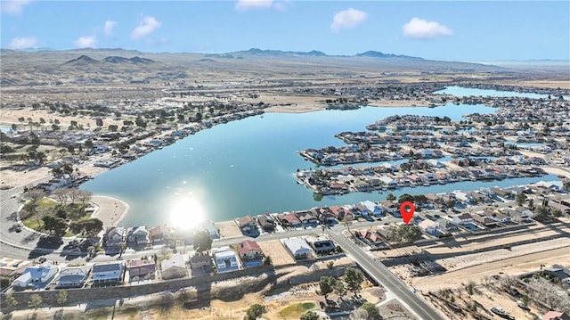 bird's eye view featuring a water and mountain view