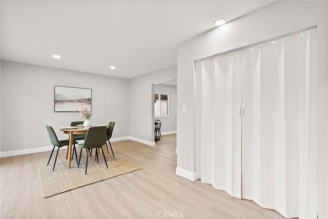 dining room featuring light hardwood / wood-style floors