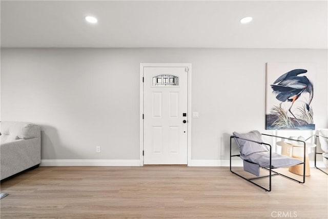 entrance foyer with light wood-type flooring