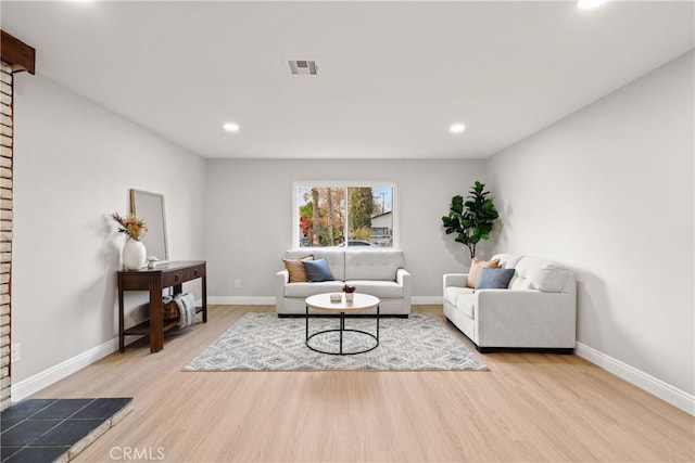 living room featuring light wood-type flooring