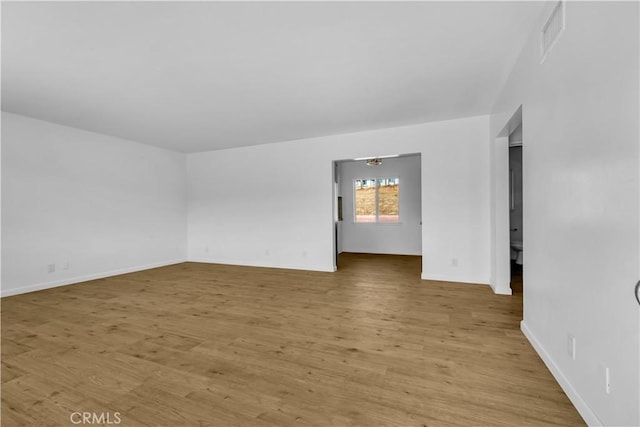 unfurnished room featuring light wood-type flooring