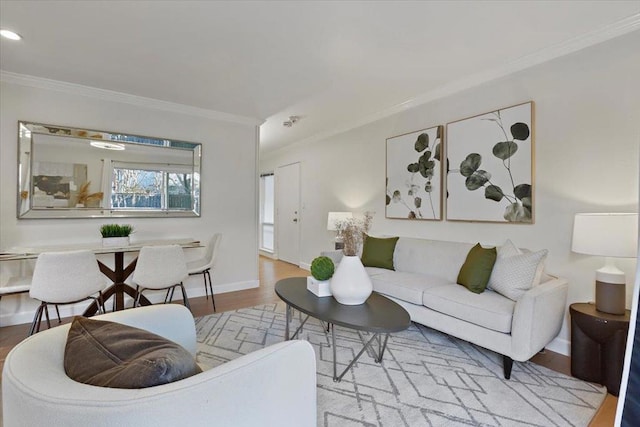 living room featuring crown molding and light wood-type flooring