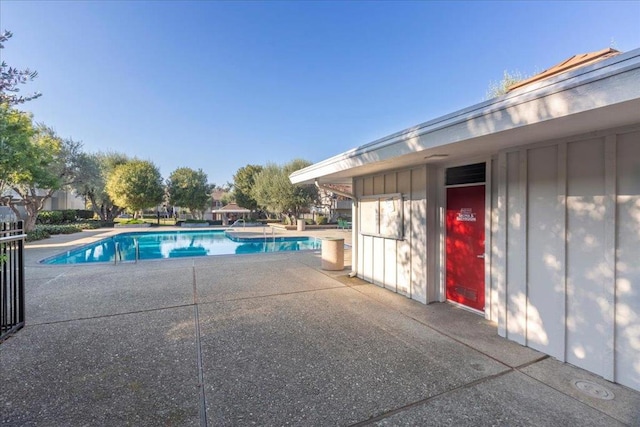 view of pool featuring a patio