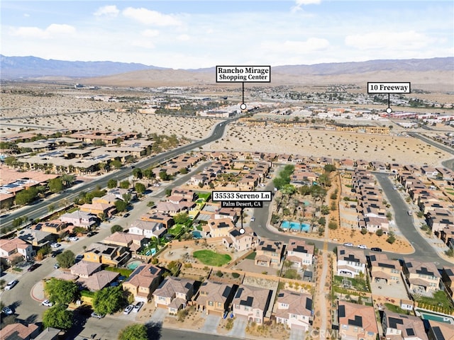 aerial view featuring a mountain view