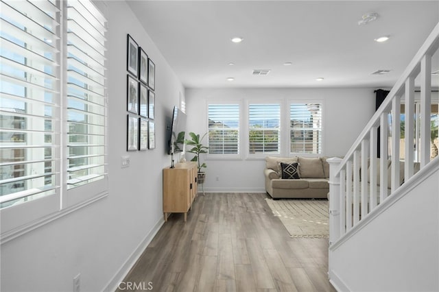 interior space with hardwood / wood-style flooring