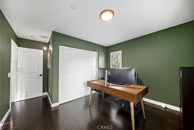 office space with dark hardwood / wood-style floors