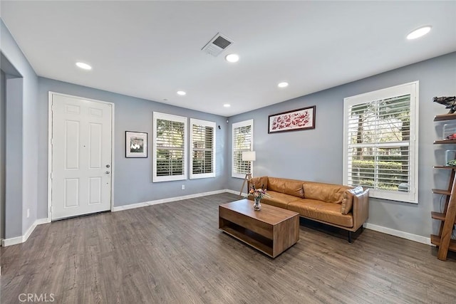 living room with dark wood-type flooring