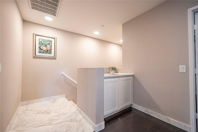 bathroom with hardwood / wood-style flooring