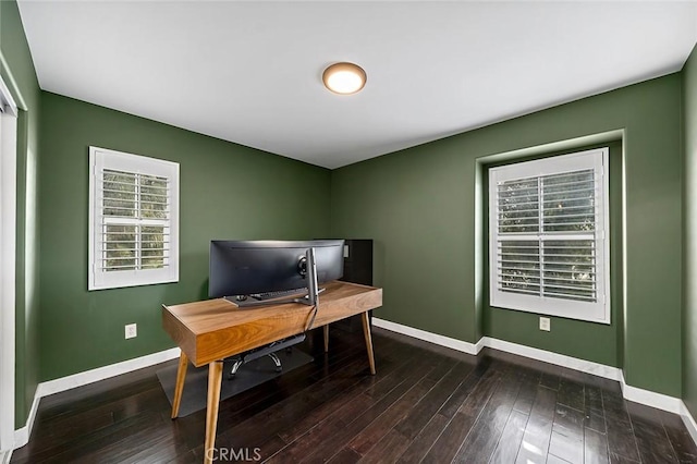 office space with wood-type flooring