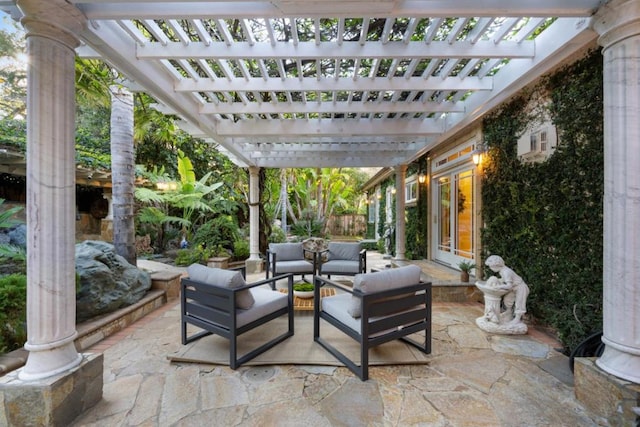 view of patio / terrace featuring an outdoor living space and a pergola