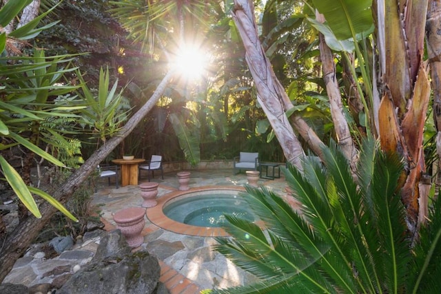 view of swimming pool featuring a patio