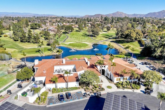 bird's eye view with a water and mountain view