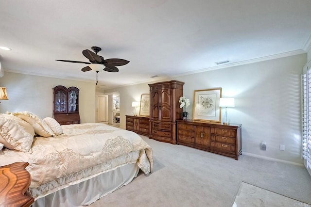 carpeted bedroom featuring ceiling fan and ornamental molding