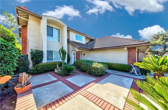 view of front of home featuring a patio