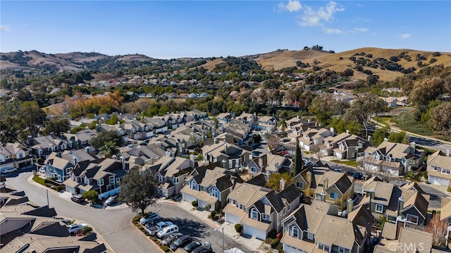 birds eye view of property featuring a mountain view