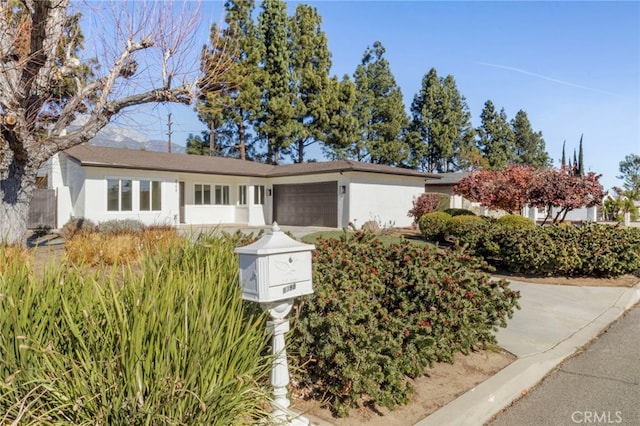 single story home with a garage