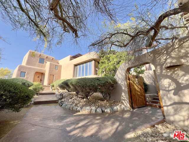 view of pueblo revival-style home