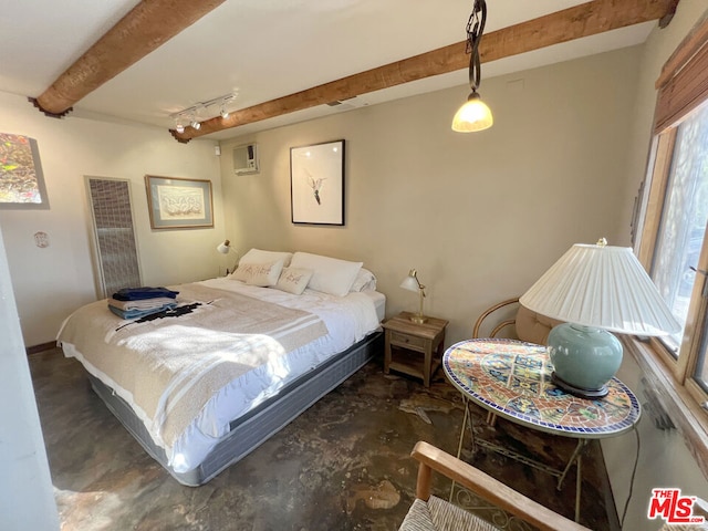 bedroom with beam ceiling, an AC wall unit, and rail lighting