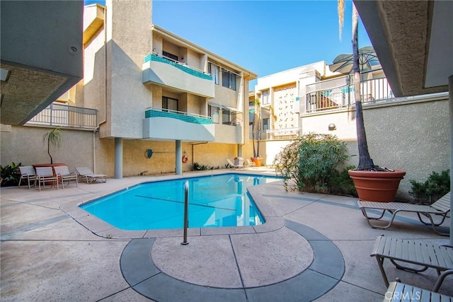 view of pool with a patio area