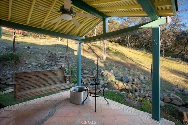 view of patio / terrace featuring ceiling fan