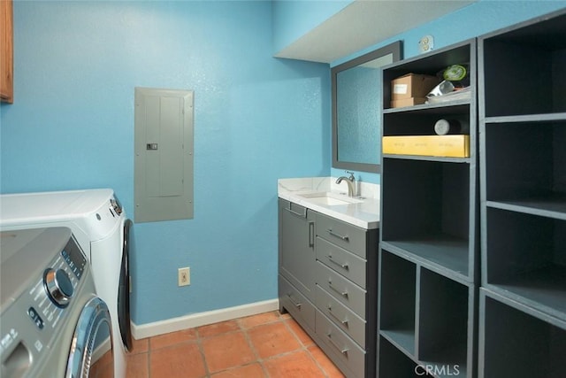 laundry room featuring sink, cabinets, separate washer and dryer, light tile patterned floors, and electric panel