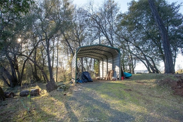 view of yard featuring a carport