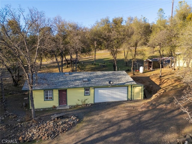 view of front of home featuring a garage