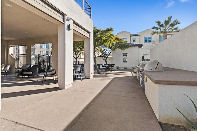 view of patio featuring exterior kitchen and area for grilling