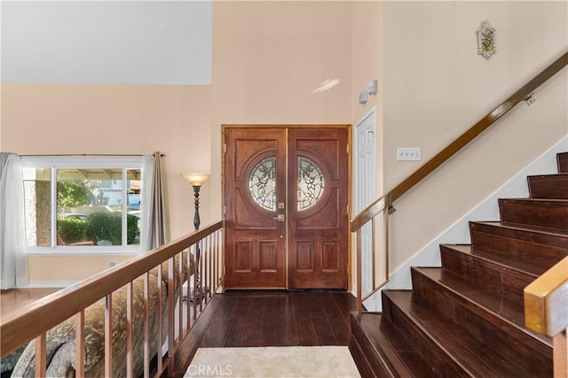 entrance foyer with dark hardwood / wood-style flooring