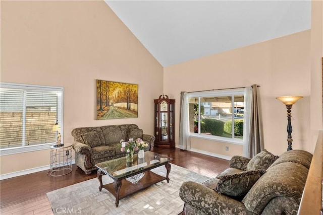 20566 Alaminos Dr, Saugus, CA 91350 - living room with high vaulted ceiling, plenty of natural light, wood finished floors, and baseboards