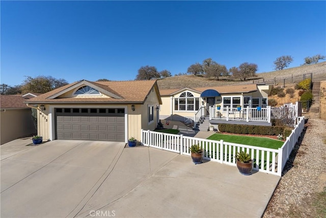 view of front of property with a garage