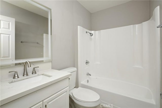 full bathroom with toilet, vanity, and shower / bathing tub combination