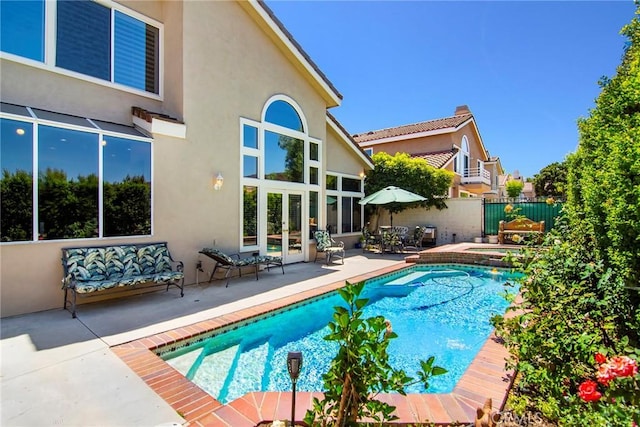 view of pool featuring a patio area