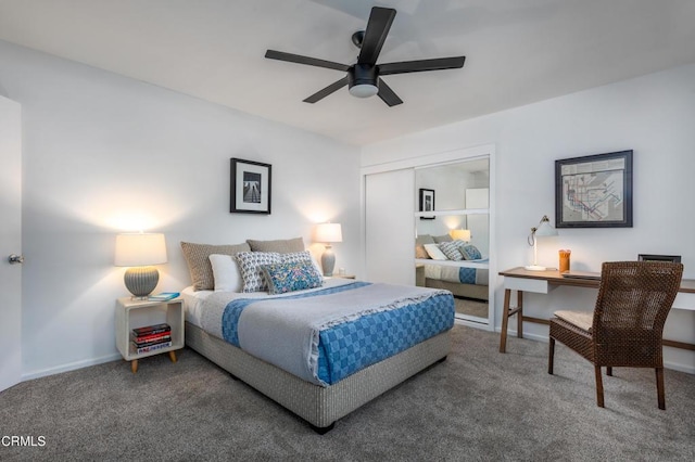 carpeted bedroom with a closet and ceiling fan