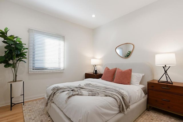 bedroom with light wood-type flooring