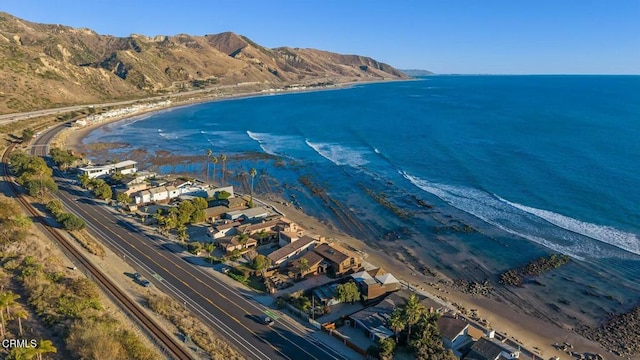 bird's eye view with a water and mountain view