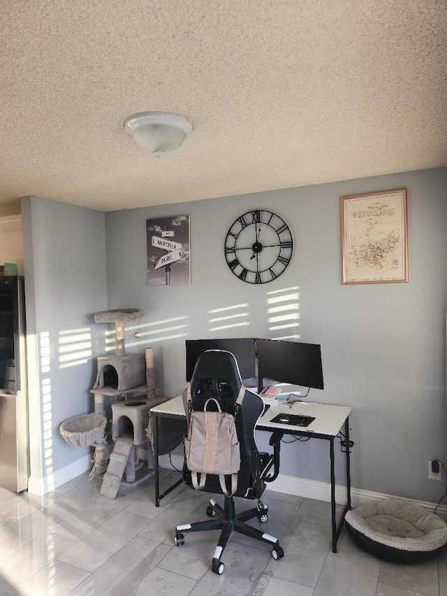 office area featuring a textured ceiling