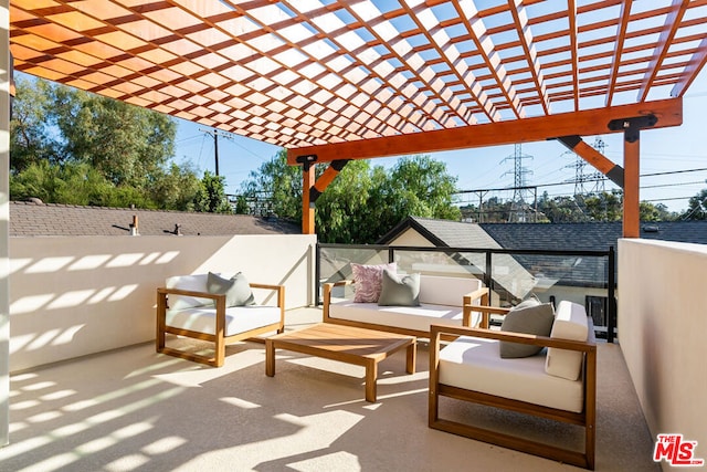 view of patio featuring an outdoor living space and a pergola