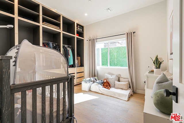 bedroom featuring hardwood / wood-style flooring