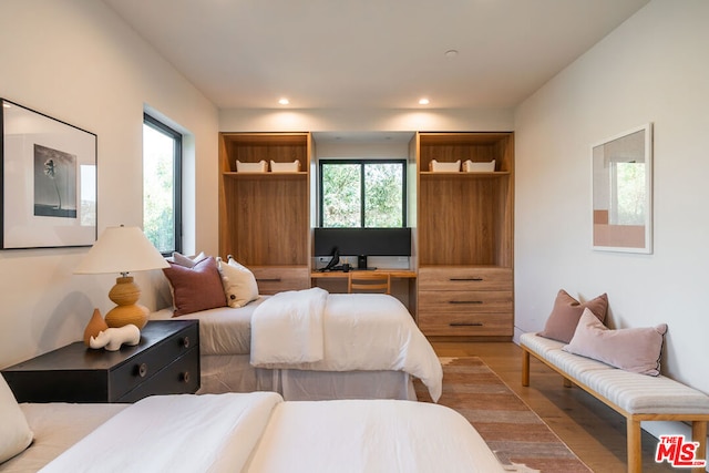 bedroom featuring hardwood / wood-style flooring