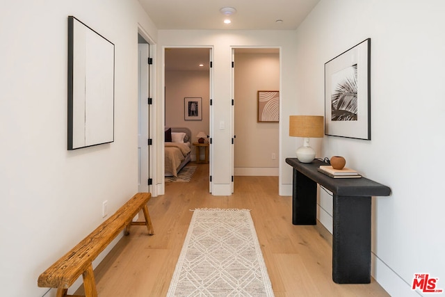 corridor featuring light wood-type flooring