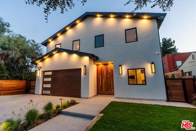 modern home featuring a garage