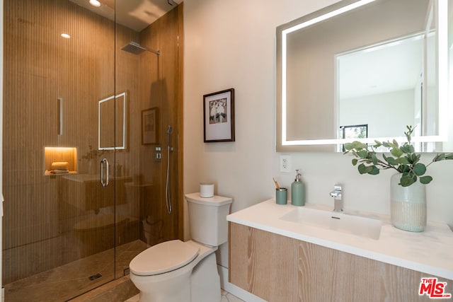 bathroom featuring sink, toilet, and walk in shower